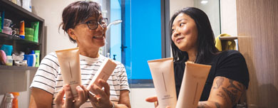 Mother and Daughter Trying Out Vulva Care Products Together